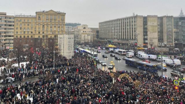 People attend a rally in support of jailed Russian opposition leader Alexei Navalny in Moscow, Russia