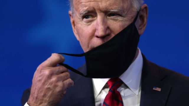 Joe Biden taking off his mask