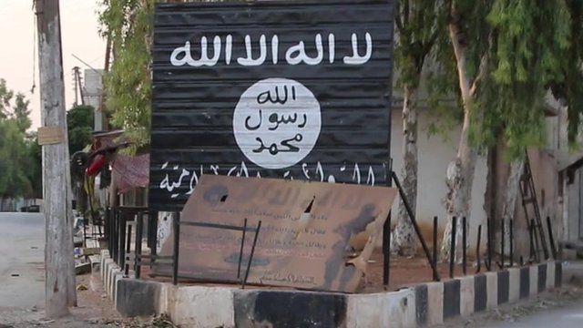 Makeshift sign belonging to so-called Islamic State in Syrian town of Jarablus