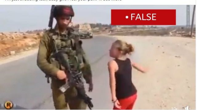 Ukrainian girl confronting a Russian soldier