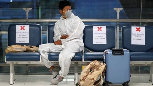 A passenger is seen at Bangkok"s Suvarnabhumi International Airport as Thailand temporarily banned all passenger flights from landing in the country to curb the outbreak of the coronavirus disease (COVID-19)