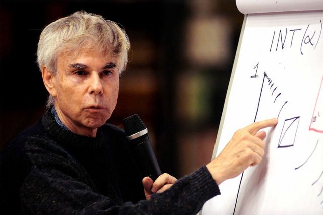 Douglas Hofstadter showing a chart on a large sheet of paper