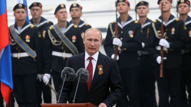 Russian President Vladimir Putin attends a military parade on May 9, 2014 in Sevastopol, Russia