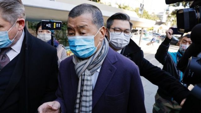 Jimmy Lai arrives at court on December 31