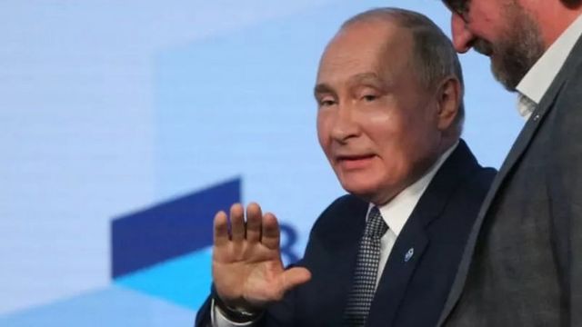 путін