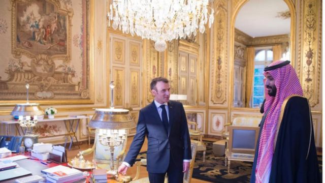 French President Emmanuel Macron pictured in 2018 with the owner of the Leonardo, Crown Prince Mohammad bin Salman