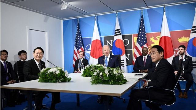 US President Joe Biden (C) flanked by US Secretary of Defense Lloyd Austin (C/R) and Secretary of State Antony Blinken (C/L) sits with South Korea's President Yoon Suk-Yeol (L) and Japan's Prime Minister Fumio Kishida (R) during a tri-lateral meeting on the sidelines of the NATO summit at the Ifema congress centre in Madrid, on June 29, 2022.