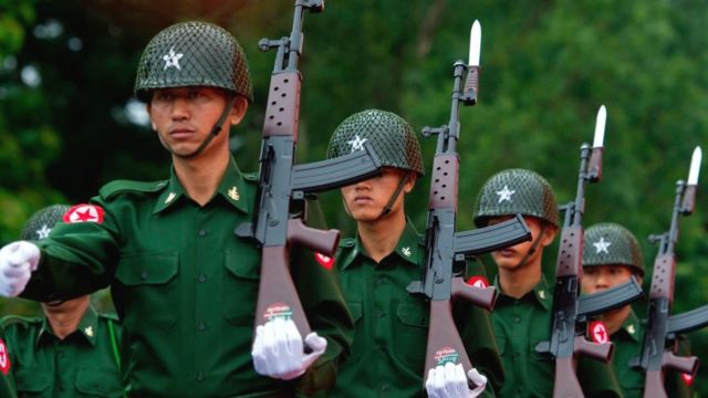 A Myanmar military guard of honour marches during a ceremony to mark the 71th anniversary of Martyrs' Day in Yangon on July 19, 2018