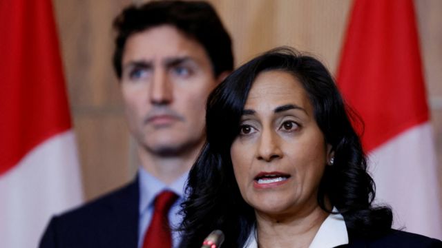 Canada's Minister of National Defence Anita Anand and Canada's Prime Minister Justin Trudeau take part in a news conference