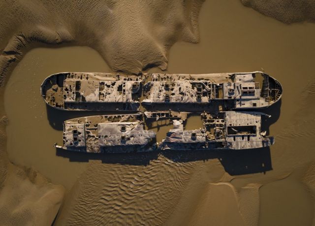 An aerial view of two shipwrecks