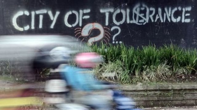 Ilustrasi: mural di dinding jalan yang bertuliskan kota toleransi?