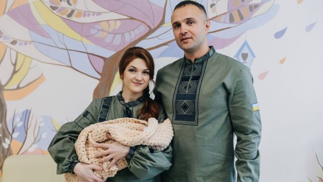 Mariana with husband Vasyl and baby