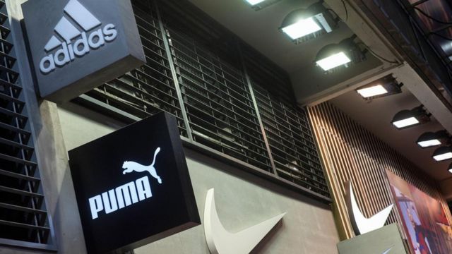 Logos das marcas Adidas e Puma