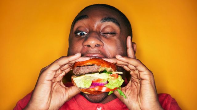 A man eating a burger