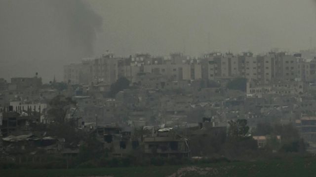 Smoke is seen over Beit Hanoun in the Gaza Strip as result of the Israeli attack from the Israeli side of the border on October 27, 2023