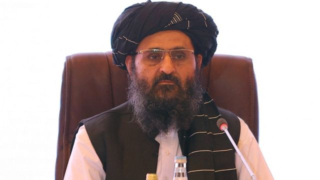 The leader of the Taliban negotiating team Mullah Abdul Ghani Baradar looks on during the final declaration of the peace talks between the Afghan government and the Taliban is presented in Qatar's capital Doha on July 18, 2021