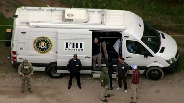 An FBI van at the site of the shooting.