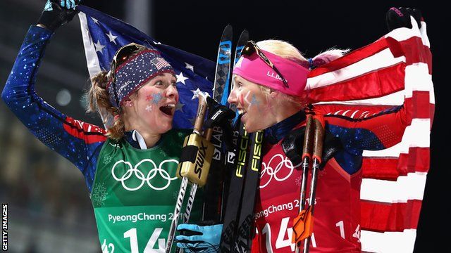 American duo Kikkan Randall and Jessica Diggins celebrate winning gold