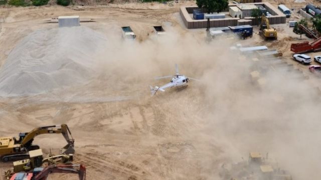 A Dyck Advisory Group helicopter lands in Palma, Mozambique in this picture taken between March 24 and March 27, 2021 and obtained by Reuters on March 30, 2021. Dyck Advisory Group