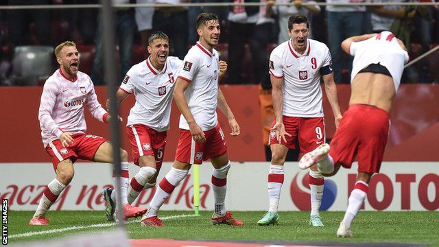 Poland's players celebrate scoring against England in a World Cup qualifier in Warsaw