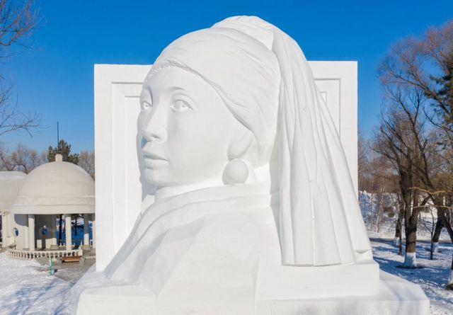 An ice sculpture of the painting Girl with a Pearl Earring by Johannes Vermeer