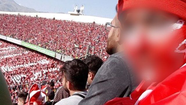 Iranian woman in Tehran football stadium