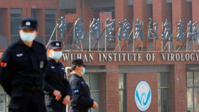 Security personnel keep watch outside Wuhan Institute of Virology