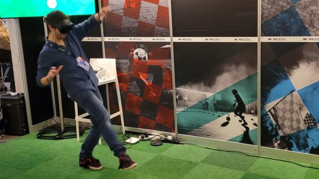 Tom Ffiske plays a virtual soccer match