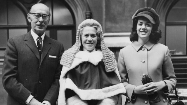 English barrister Rose Heilbron (1914 - 2005) arrives at the House of Lords in London with her husband Dr Nathaniel Burstein and daughter Hilary (right)