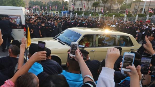 The royal car of the Queen and Her Royal Highness Princess Maha Chakri Sirindhorn Prince Thipangkorn Rasmachot moves through the crowd