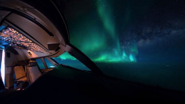 Northern lights and a plane's cockpit