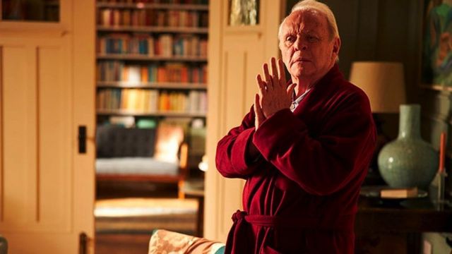 Sir Anthony Hopkins in a red dressing gown