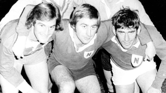Chris Dawson (left) with two of his rugby teammates in 1974
