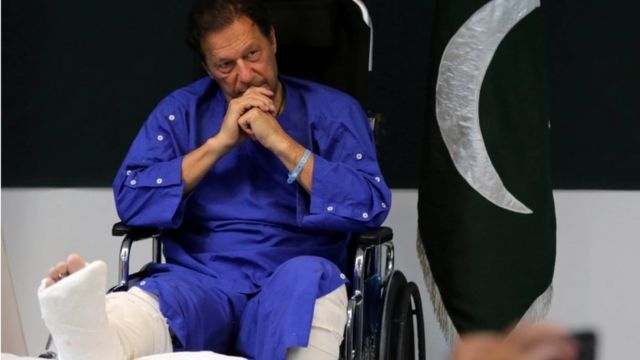 Imran Khan speaks with reporters at Shaukat Khanum Hospital, where he was admitted after being shot dead the previous day near Wazirabad in Lahore, Pakistan November 4, 2022.