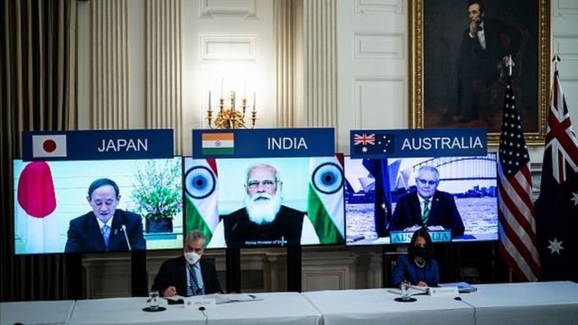 Former Japan Prime Minister Yoshihide Suga, Prime Minister Narendra Modi and former Australia Prime Minister Scott Morrison at a virtual meeting of the Quad on 12 March 2021