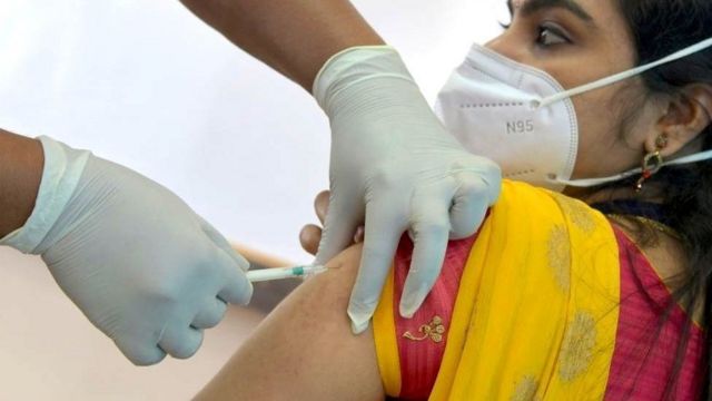 A volunteer receives the Covid-19 vaccine at a mock run in India's Karnataka