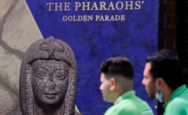 A poster advertising The Pharaohs' Golden Parade in Cairo, Egypt