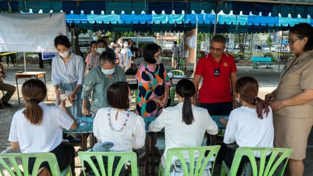 Voting gets underway at an outdoor polling station in Bangkok