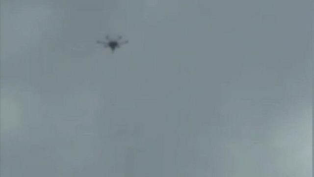A still of a video showing a drone in flight