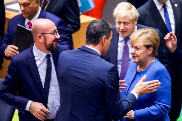 Меркель и Джонсон