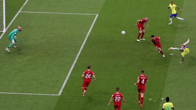 Richarlison scoring with a bicycle kick against Serbia