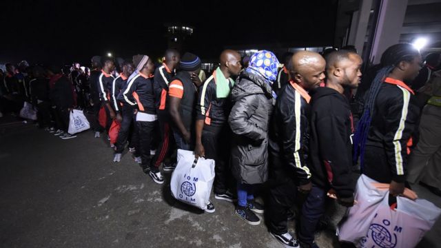 About 150 Libya Returnees wey just land for Murtala Mohammed International Airport in Lagos, on December 5, 2017 dey wait for officials to attend to dem.