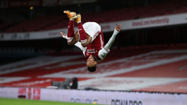 Arsenal's Gabonese striker Pierre-Emerick Aubameyang celebrates scoring the opening goal during the English Premier League football match between Arsenal and Newcastle United at the Emirates Stadium in London on January 18, 2021