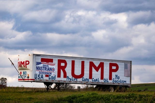 A trailer with messages in favor of Donald Trump and Doug Mastrian, the Republican candidate for governor of Pennsylvania, is seen along I-76 in western Pennsylvania, Monday, Oct. 17, 2022.