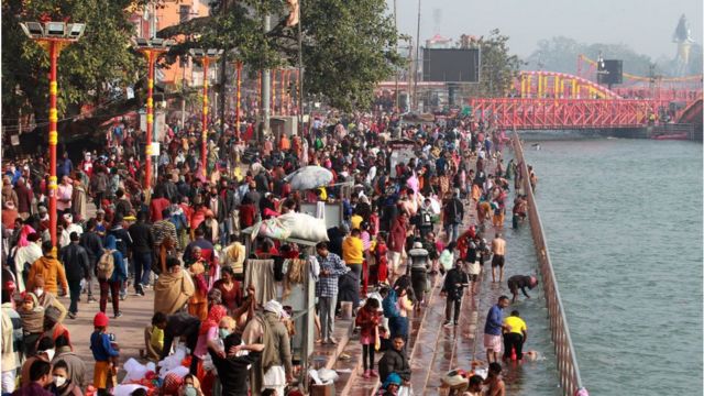 Hindu devotees on the banks of the river Ganges at Haridwar on 14 January