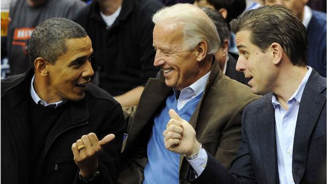 President Obama and both Biden men at a basketball game in 2010