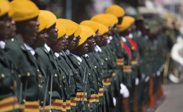 Members of the Presidential Guard stand guard outside the House of Parliament before the official opening of the Fourth Session of the Eighth Parliament of Zimbabwe in Harare, Zimbabwe, 12 September 2017. The Fifth Session will be the last before the 2018 elections of which the date is yet to be set.