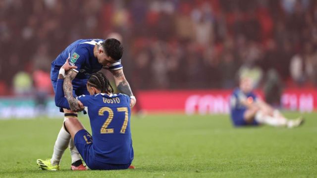 Enzo Fernandez of Chelsea comforts Malo Gusto