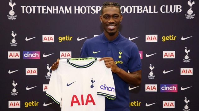 Yves Bissouma holding Tottenham's new home shirt