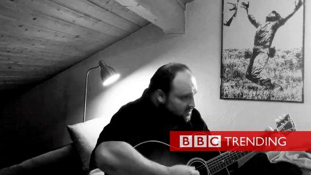 screen shot from a video showing musician Alex Diehl playing his song